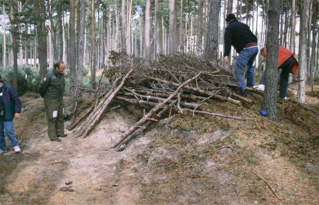 Building a survival shelter. Image from James Allan of the Geograph Project